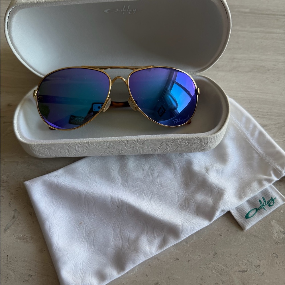 Oakley Gold Frame Sunglasses with Reflective Blue/purple lenses